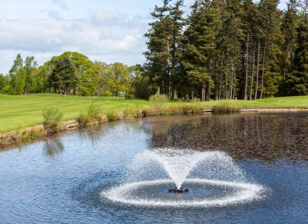 Otterbine aerating fountain in a lake at Slaley Hall.